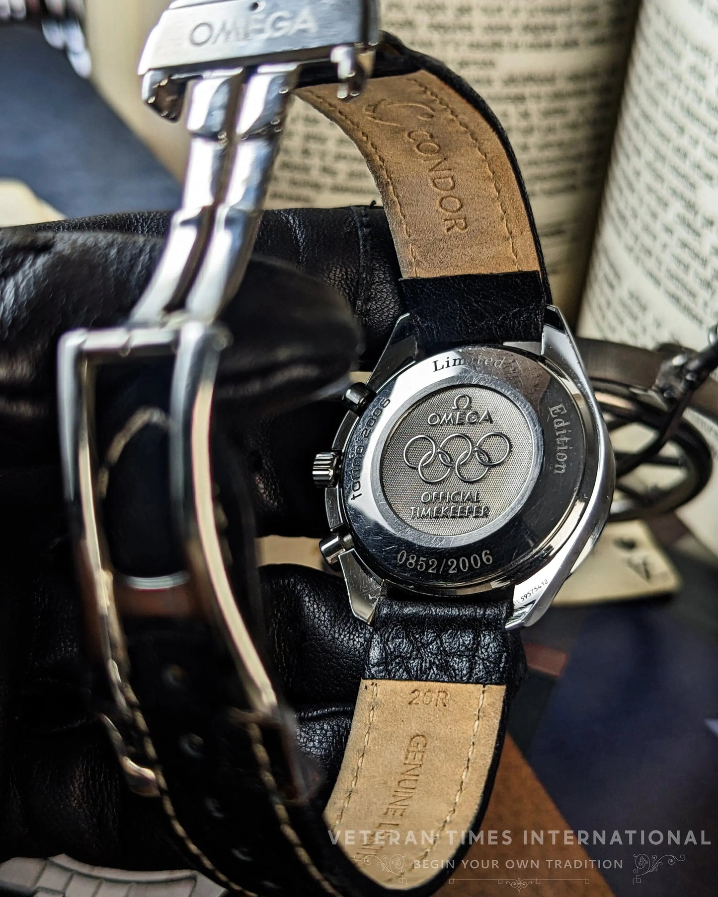 0163_Omega_Speedmaster_-_Torino_Olympics_-_Automatic_Cal.3220A_-_Limited_Edition_-_2006_Swiss8 - Veteran Times Int